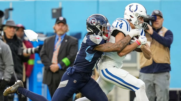 Indianapolis Colts wide receiver Alec Pierce (14) receives a long pass to put the Colts at first and goal in overtime Sunday, Dec. 3, 2023, at Nissan Stadium in Nashville, Tenn. The Colts went on to score to win in overtime, 31-28.